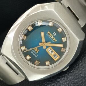 Vintage 1975 Ricoh Automatic Mens Silver Watch W/daydate & Blue accents